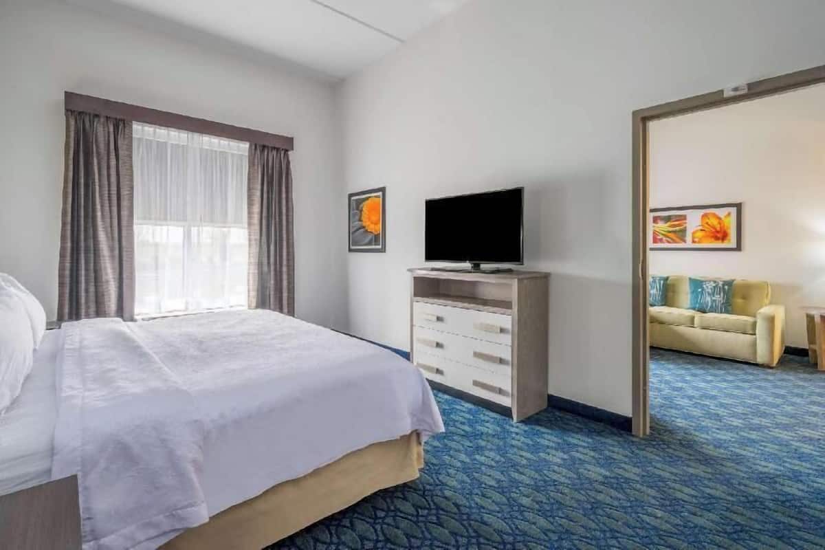 Premium bedding, down duvets, in-room safe, desk