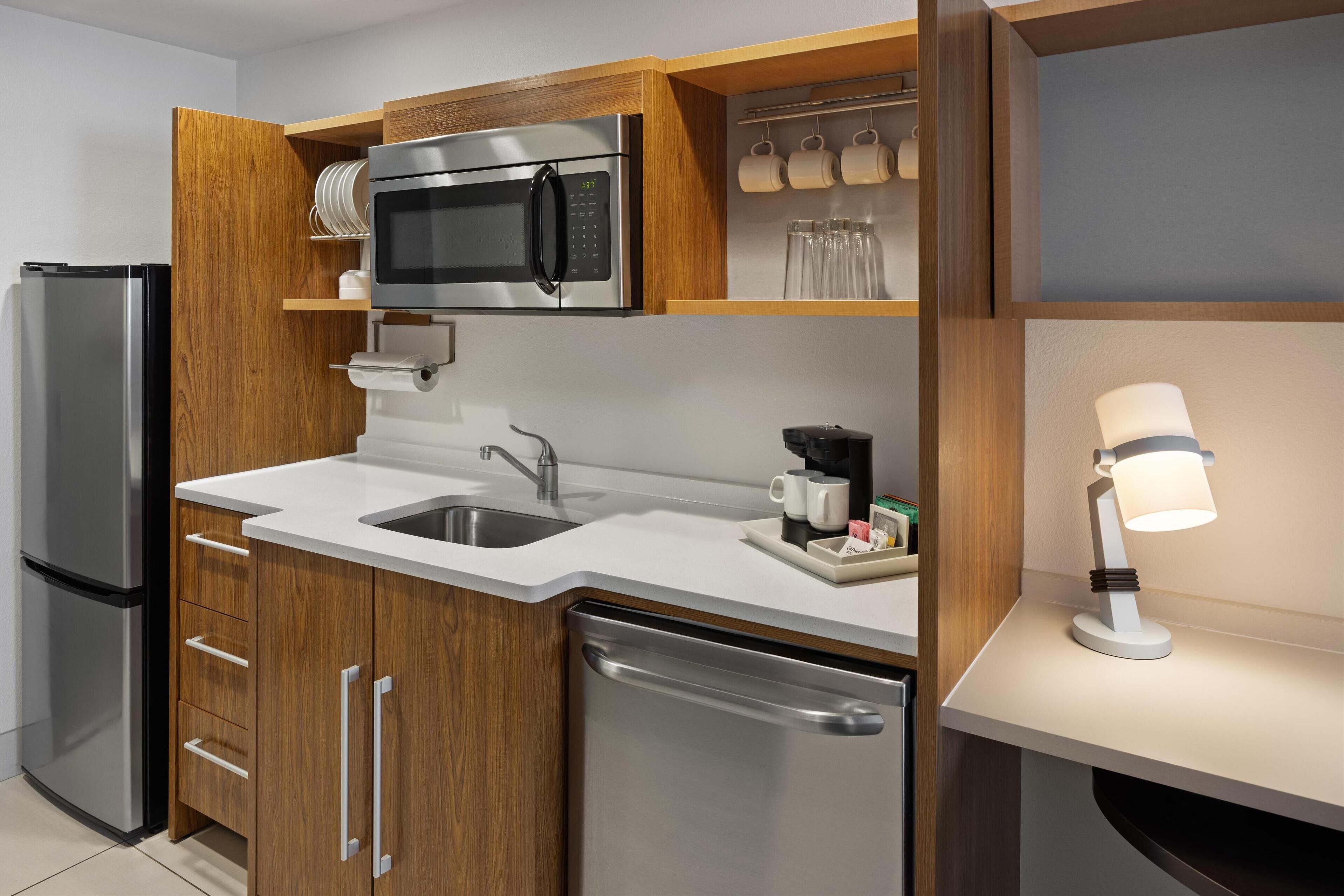 fridge, microwave, dishwasher, cookware/dishes/utensils