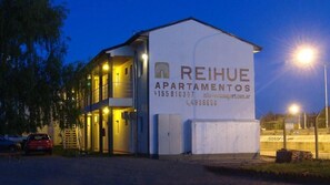 Residential apartments with balconies and parking available.