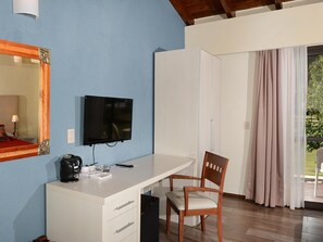 Relax in this stylish room with a flat-screen TV, kitchenette, and desk area.