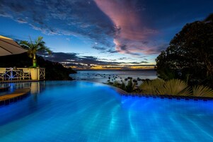 Outdoor pool, pool umbrellas, sun loungers