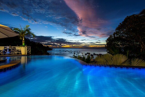 Outdoor pool, pool umbrellas, pool loungers
