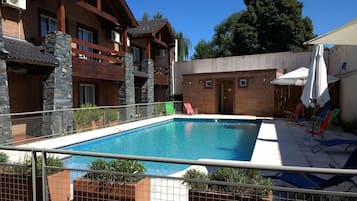 Alberca al aire libre por temporada