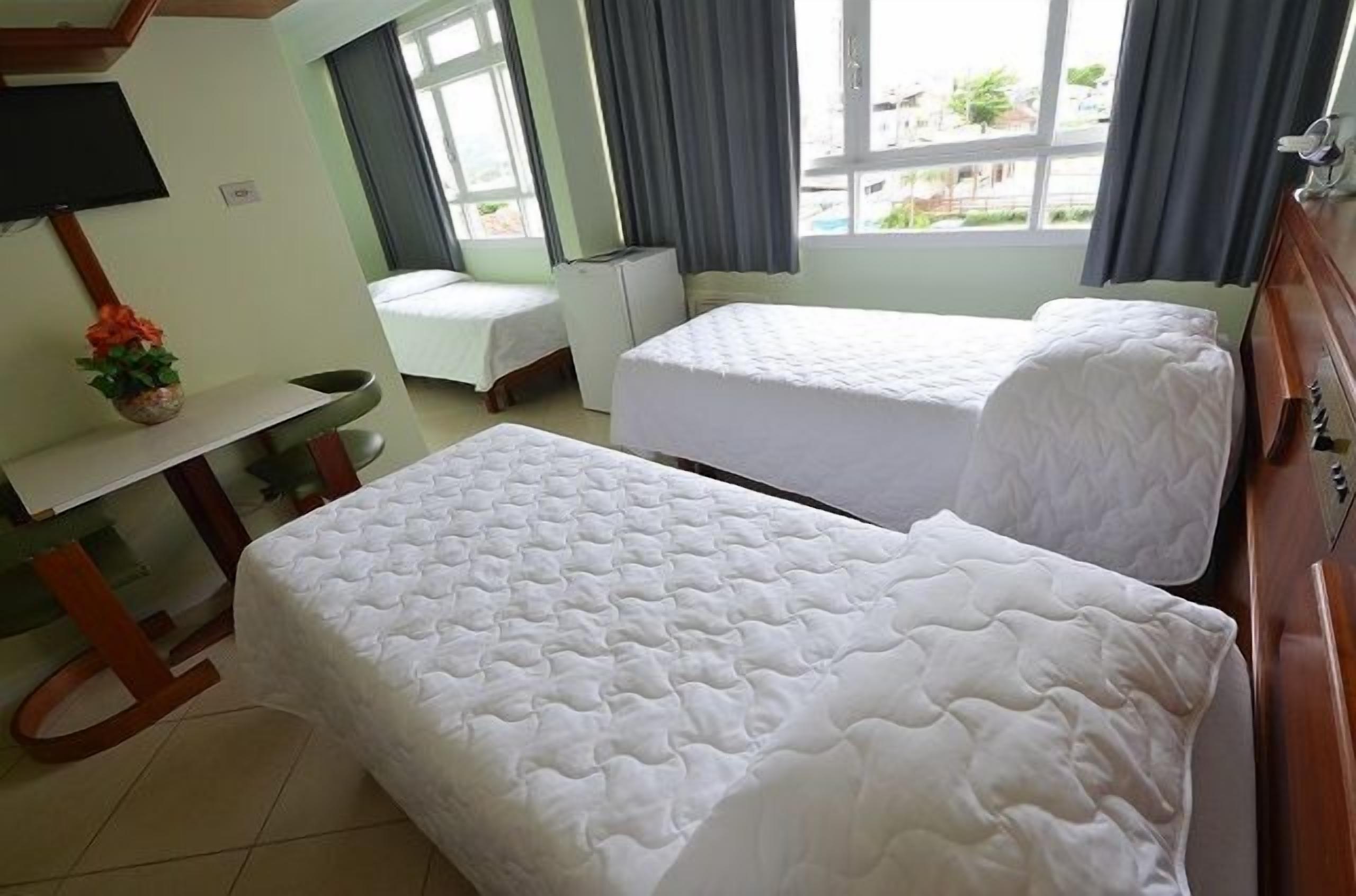 superior triple room, ocean view | minibar, desk, blackout curtains, free wifi