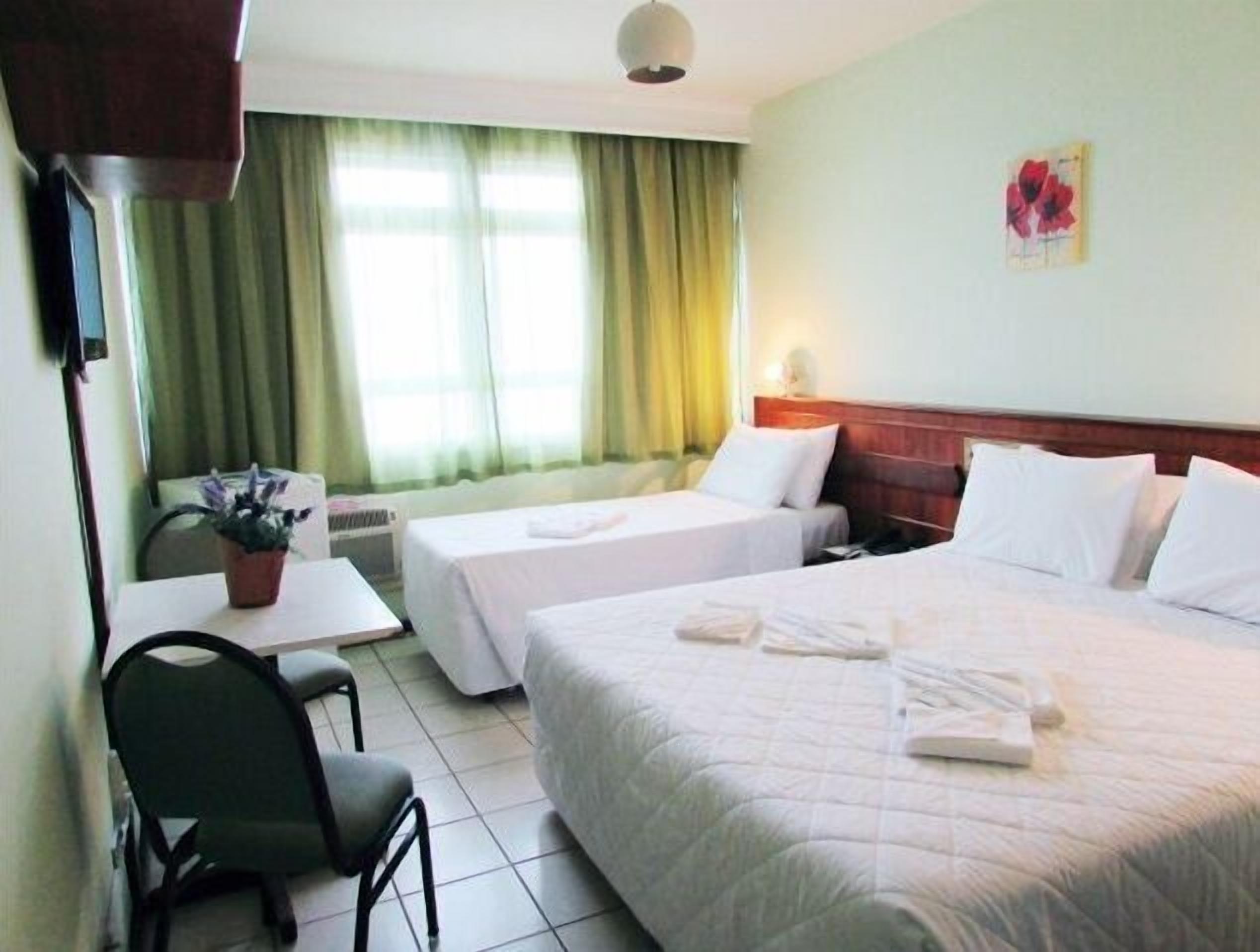 superior triple room, ocean view | minibar, desk, blackout curtains, free wifi