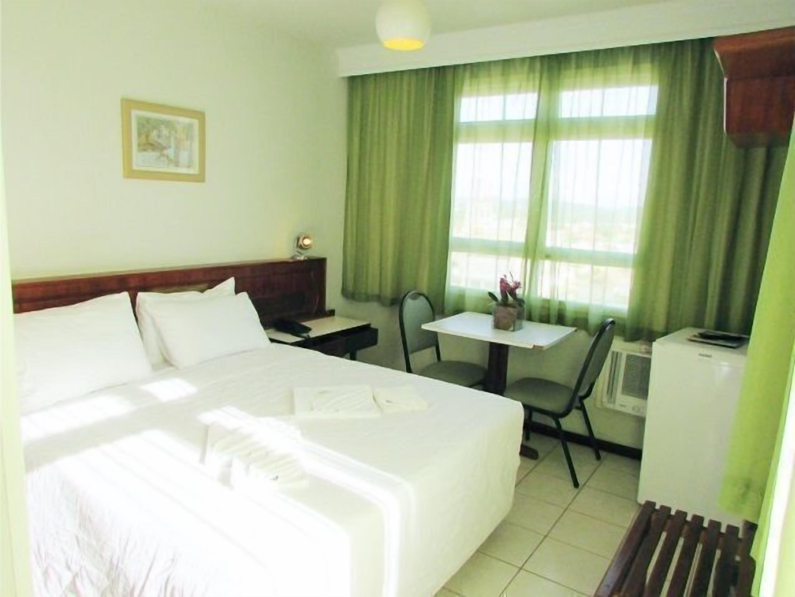 superior quadruple room, pool view | minibar, desk, blackout curtains, free wifi