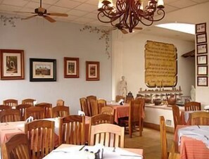 Breakfast, lunch, dinner served; Regional cuisine, garden views 