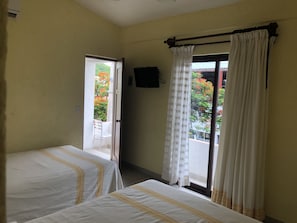 Economy Double Room, 2 Double Beds | Iron/ironing board, free WiFi, bed sheets - Hotel Maria Mixteca (Santa María Huatulco)