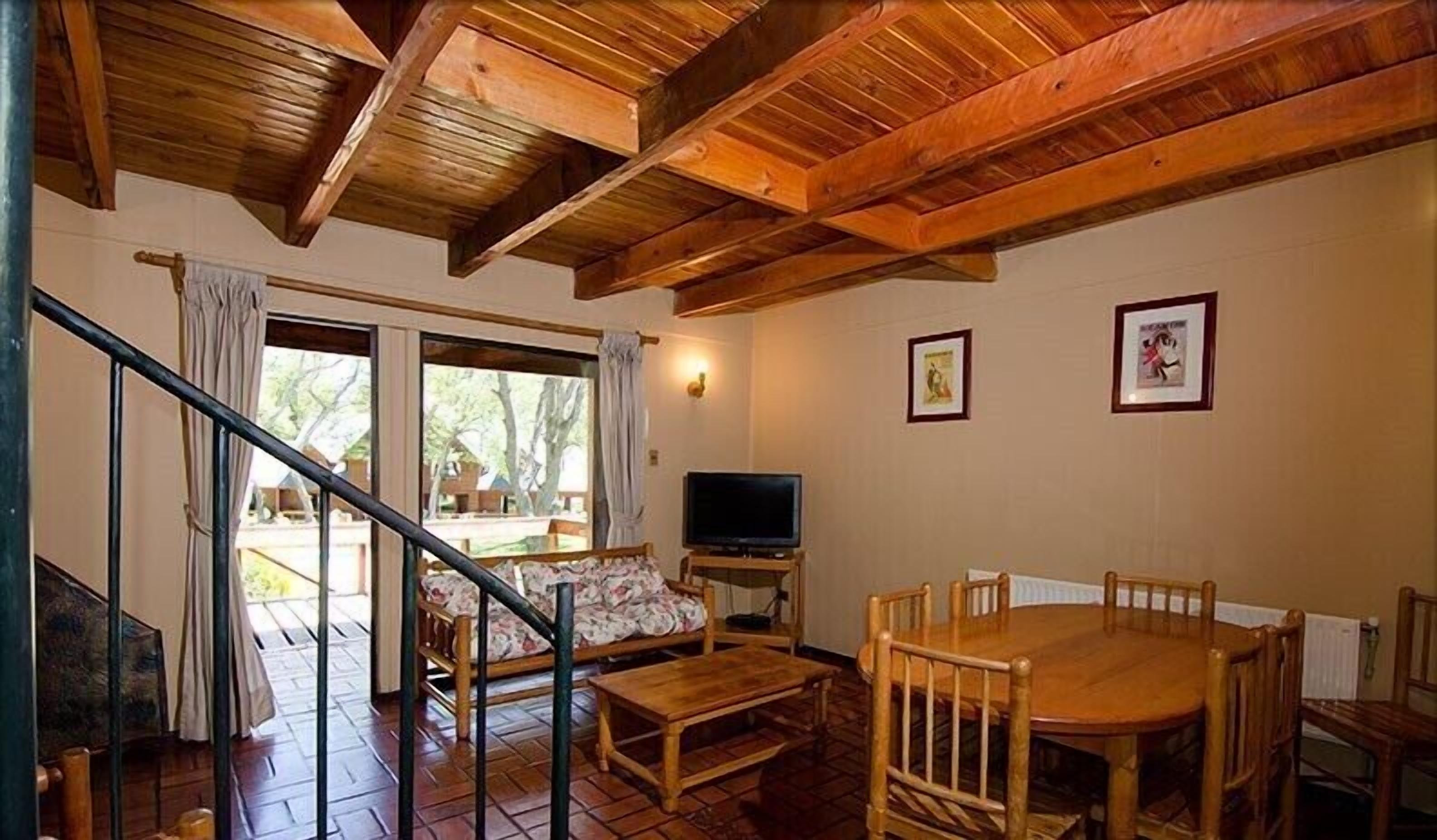 Standard Cabin, 3 Bedrooms | Living room | Flat-screen TV