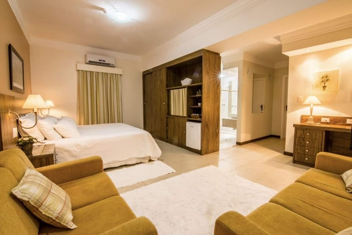 luxury suite, 1 king bed | minibar, desk, blackout curtains, free wifi