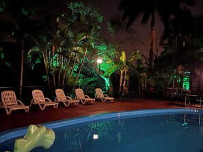 Outdoor pool, open 9:00 AM to 8:00 PM, pool loungers