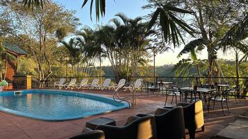 Outdoor pool, open 9:00 AM to 8:00 PM, sun loungers