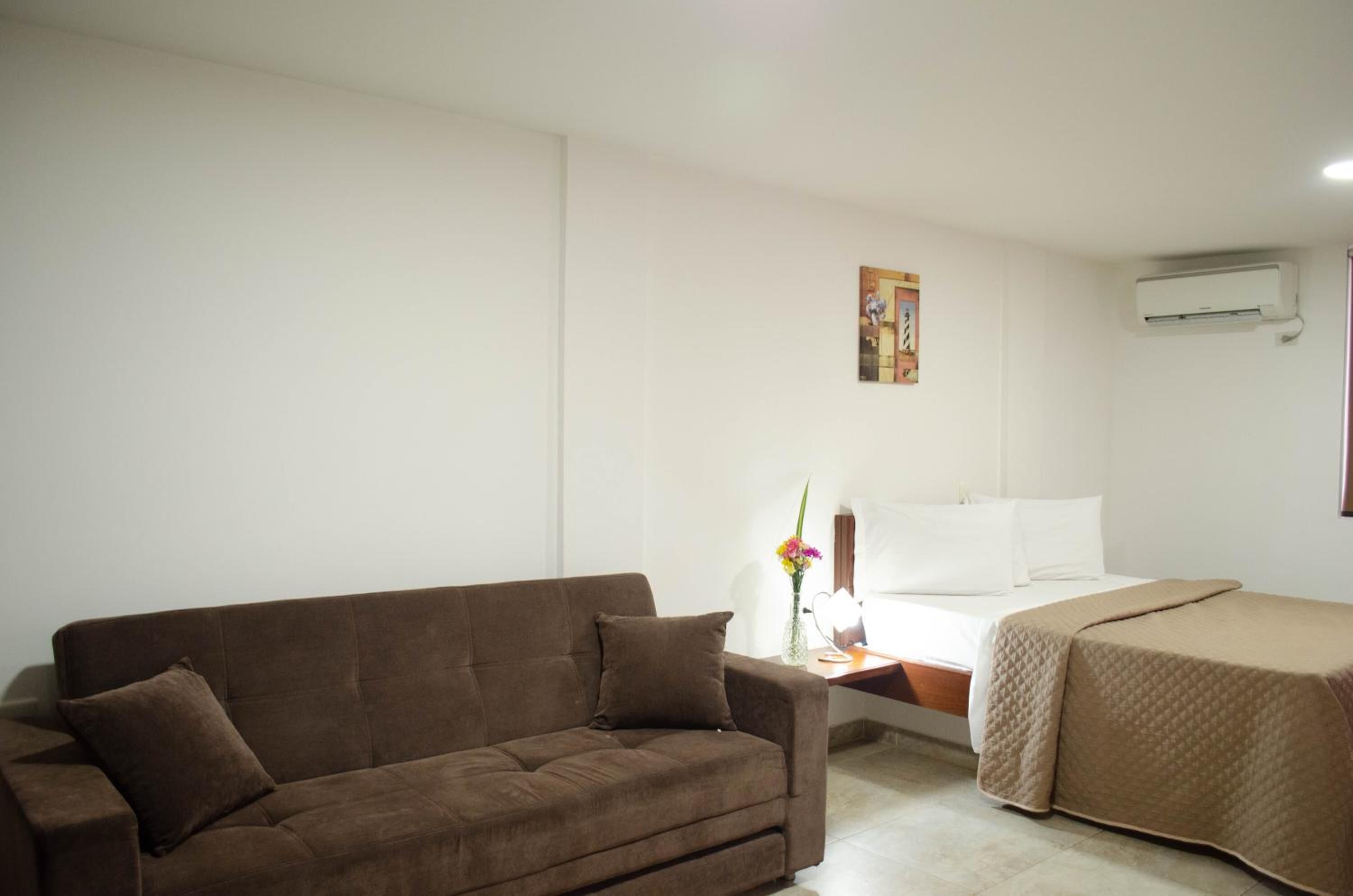 desk, laptop workspace, blackout curtains, iron/ironing board