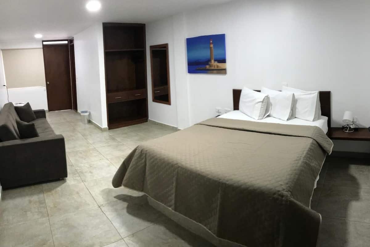 desk, laptop workspace, blackout curtains, iron/ironing board