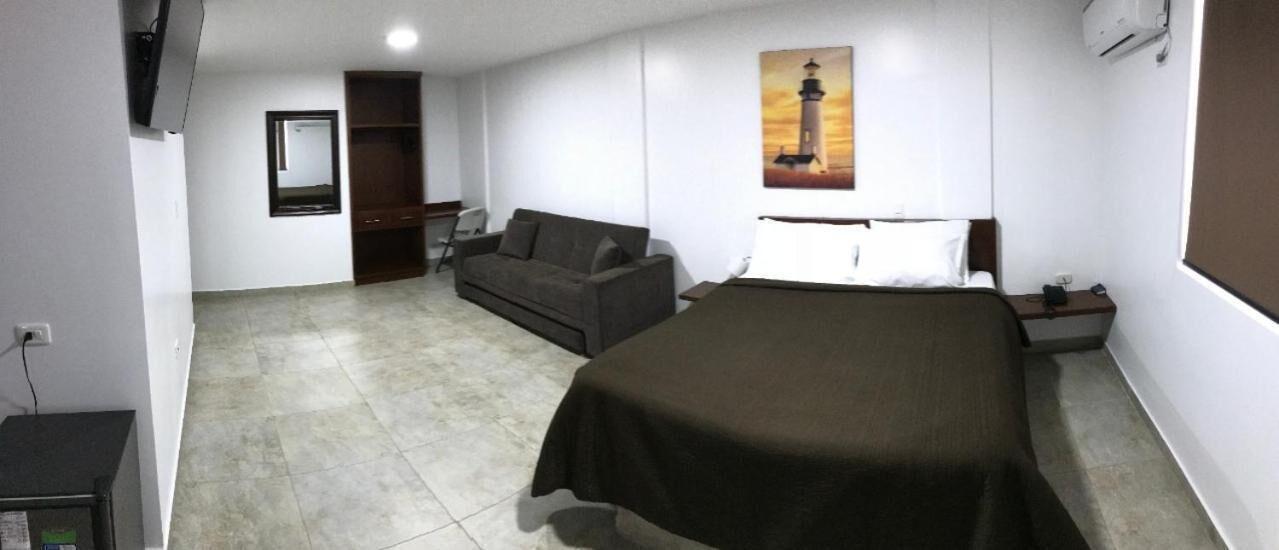 desk, laptop workspace, blackout curtains, iron/ironing board