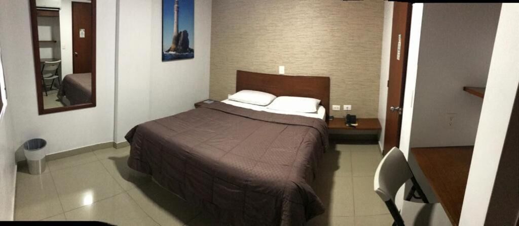 desk, laptop workspace, blackout curtains, iron/ironing board