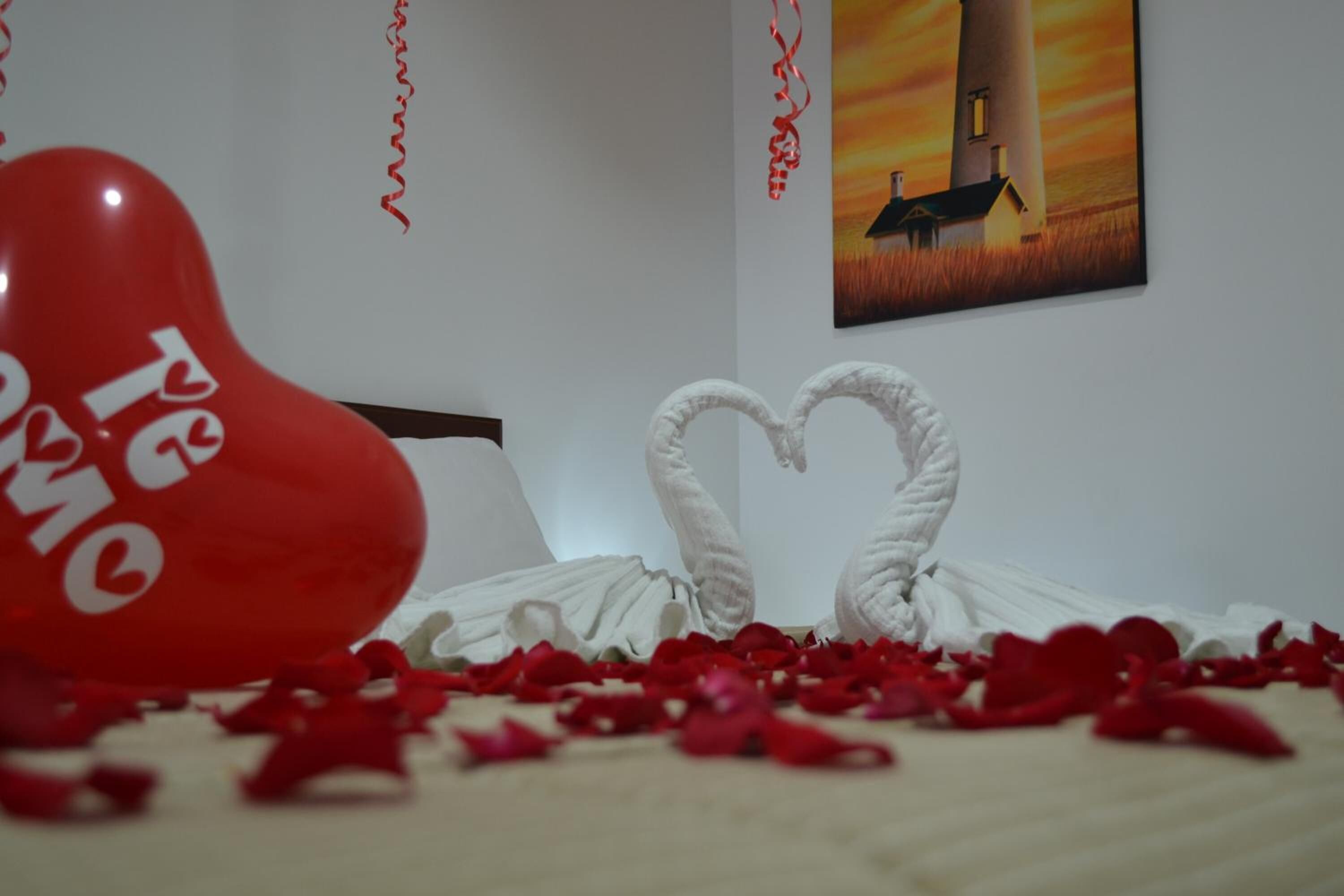 desk, laptop workspace, blackout curtains, iron/ironing board