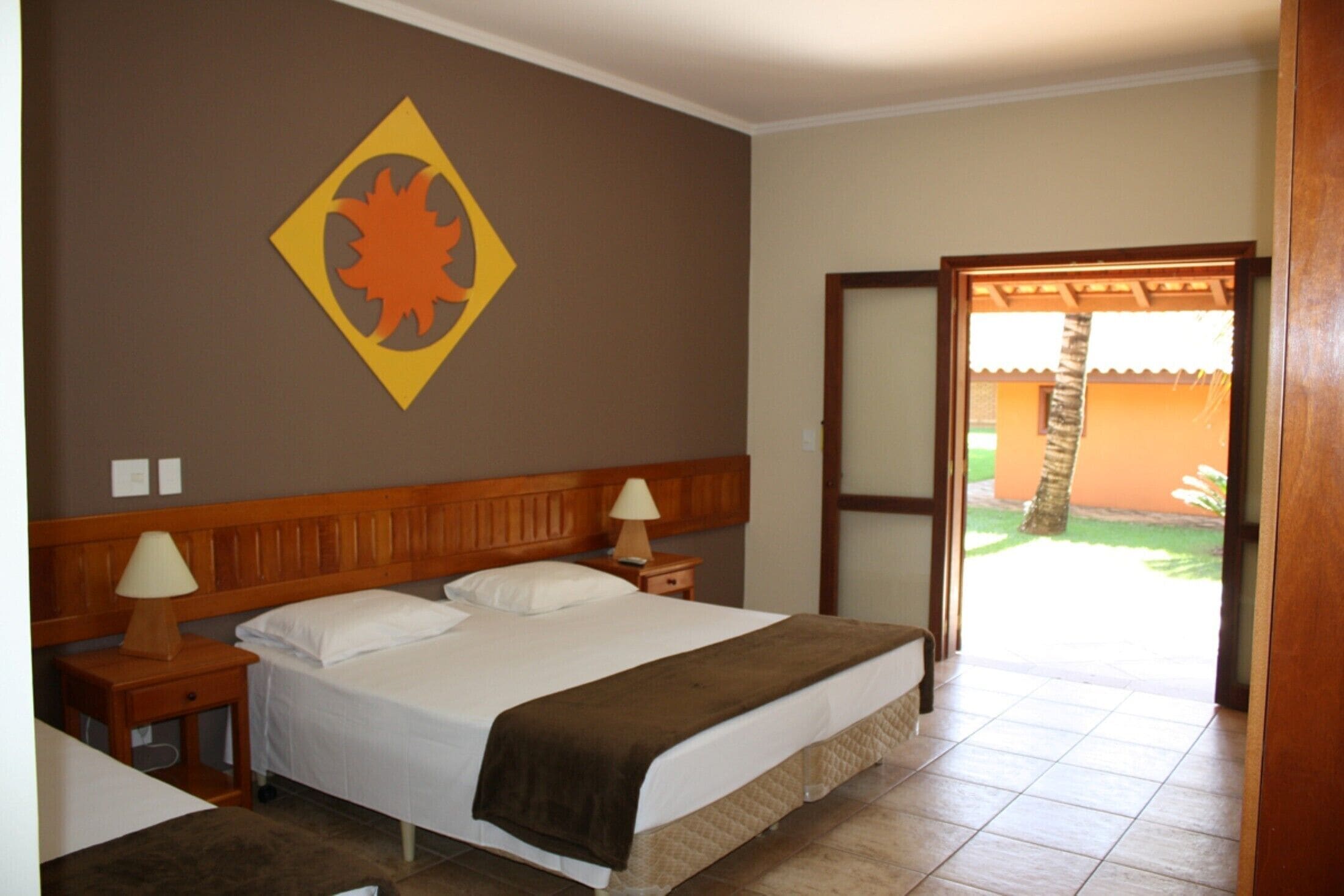 standard quadruple room, garden view | minibar, in-room safe, free wifi