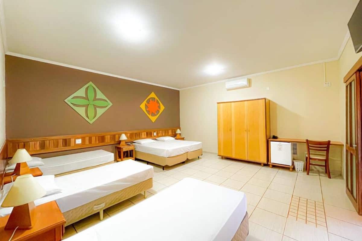 family room, pool view | minibar, in-room safe, free wifi