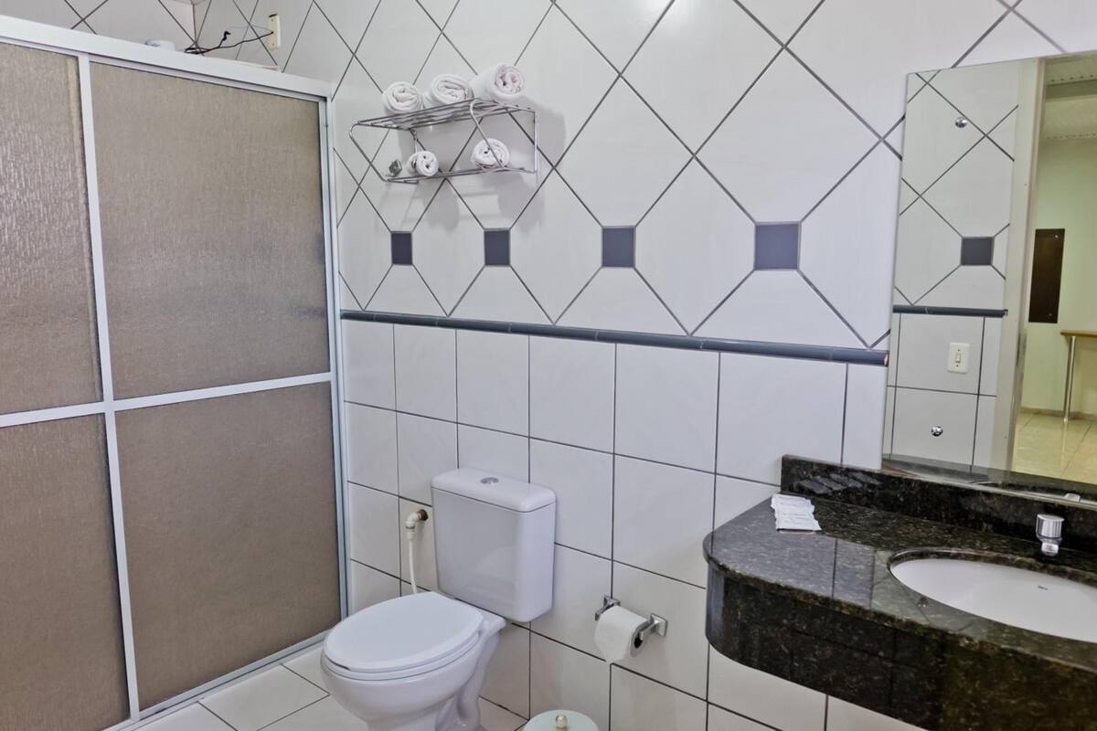 standard triple room | bathroom | shower, rainfall showerhead, free toiletries, hair dryer