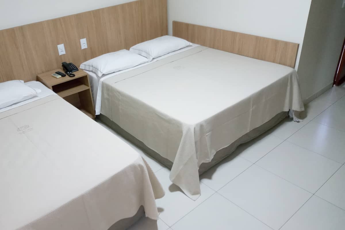 Family Triple Room | Minibar, desk, blackout drapes, free WiFi