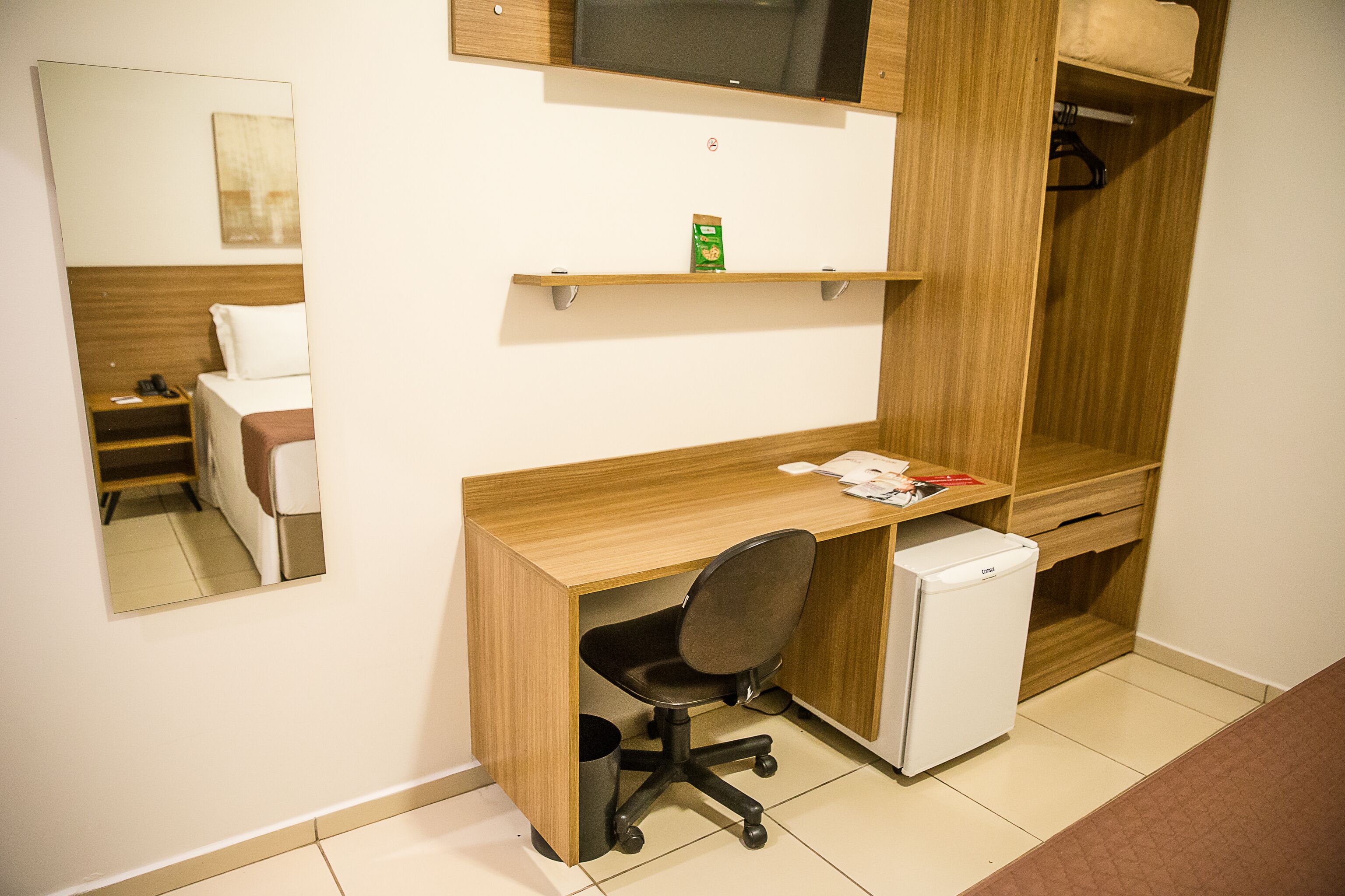 minibar, desk, blackout curtains, iron/ironing board