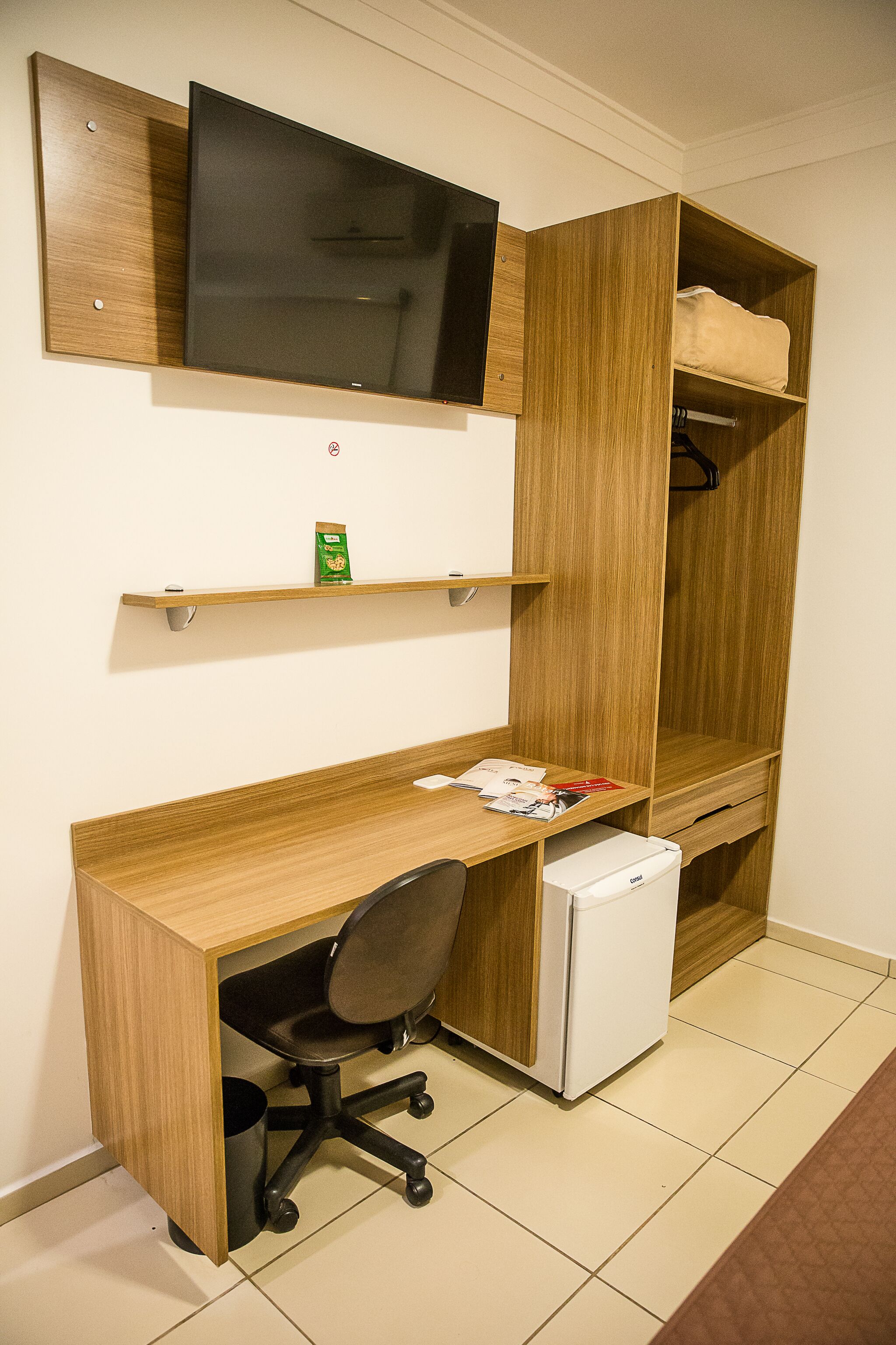 minibar, desk, blackout curtains, iron/ironing board