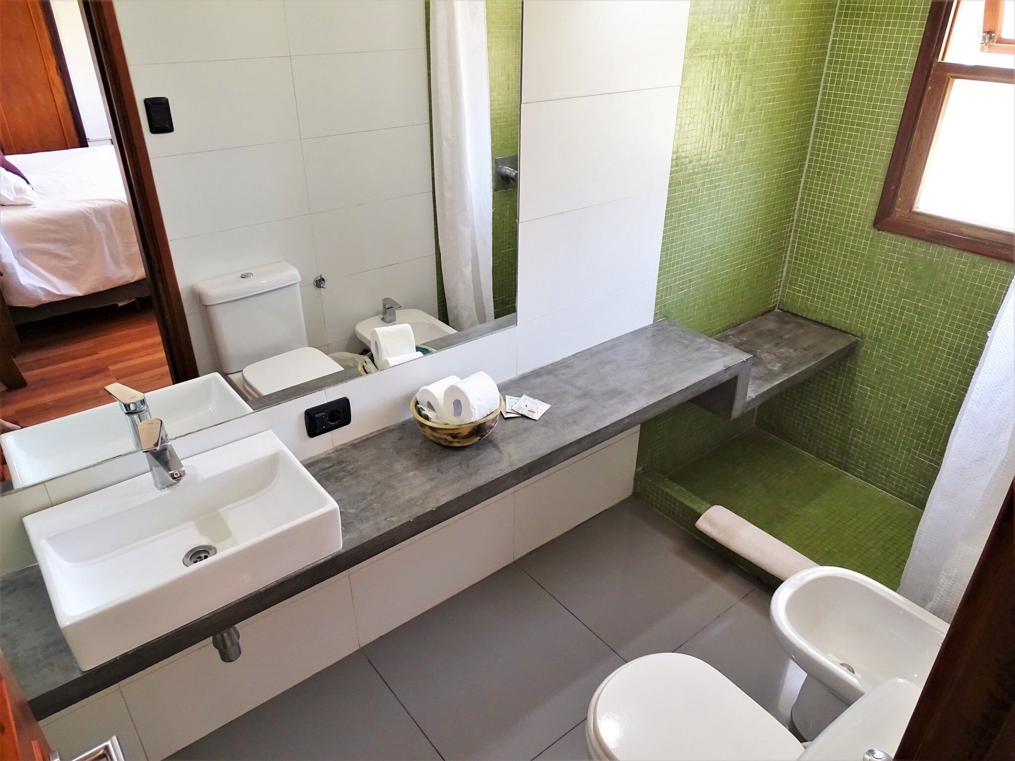 deluxe double room | bathroom | shower, bidet, towels, soap