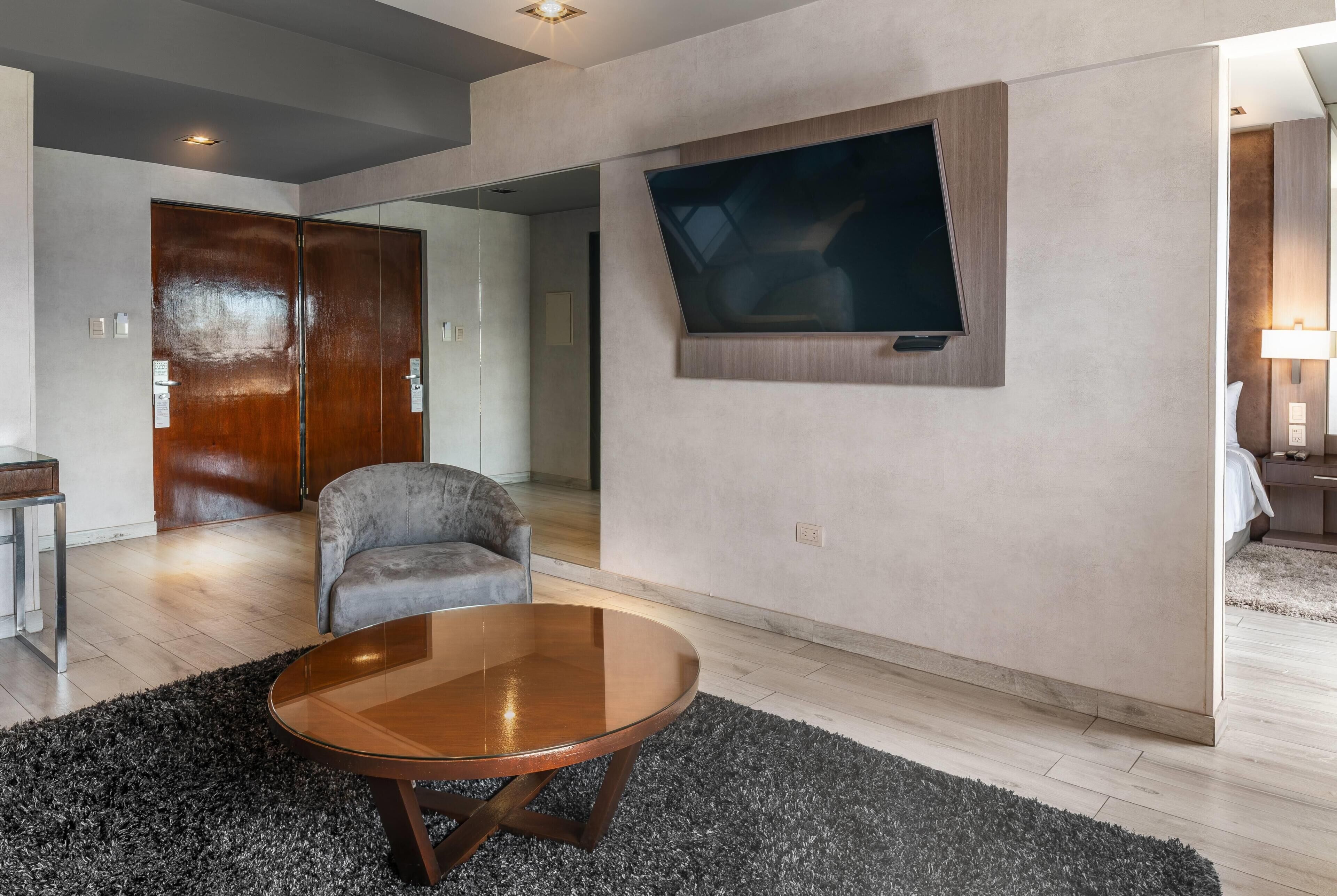 Premium Suite, 1 King Bed, Non Smoking | In-room safe, blackout curtains, soundproofing, free cots/infant beds