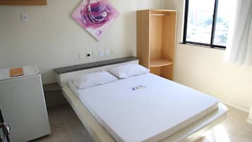 Frigobar, cortinas blackout, Wi-Fi de cortesia, roupa de cama