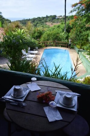 Outdoor pool, pool umbrellas, pool loungers