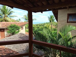 Habitación triple económica, vistas al mar | Minibar, wifi gratis, ropa de cama