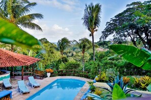 Outdoor pool, pool umbrellas, pool loungers