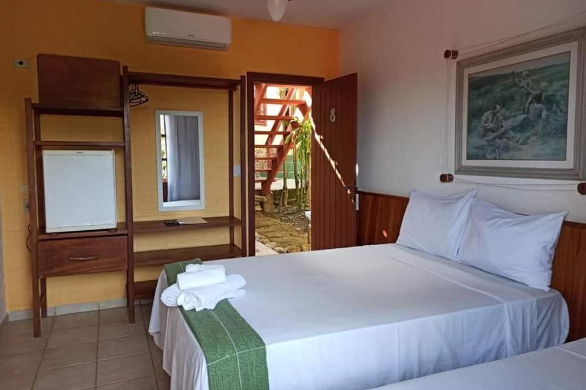 Triple Room, Ocean View, Ground Floor | Minibar, WiFi (free), bed sheets