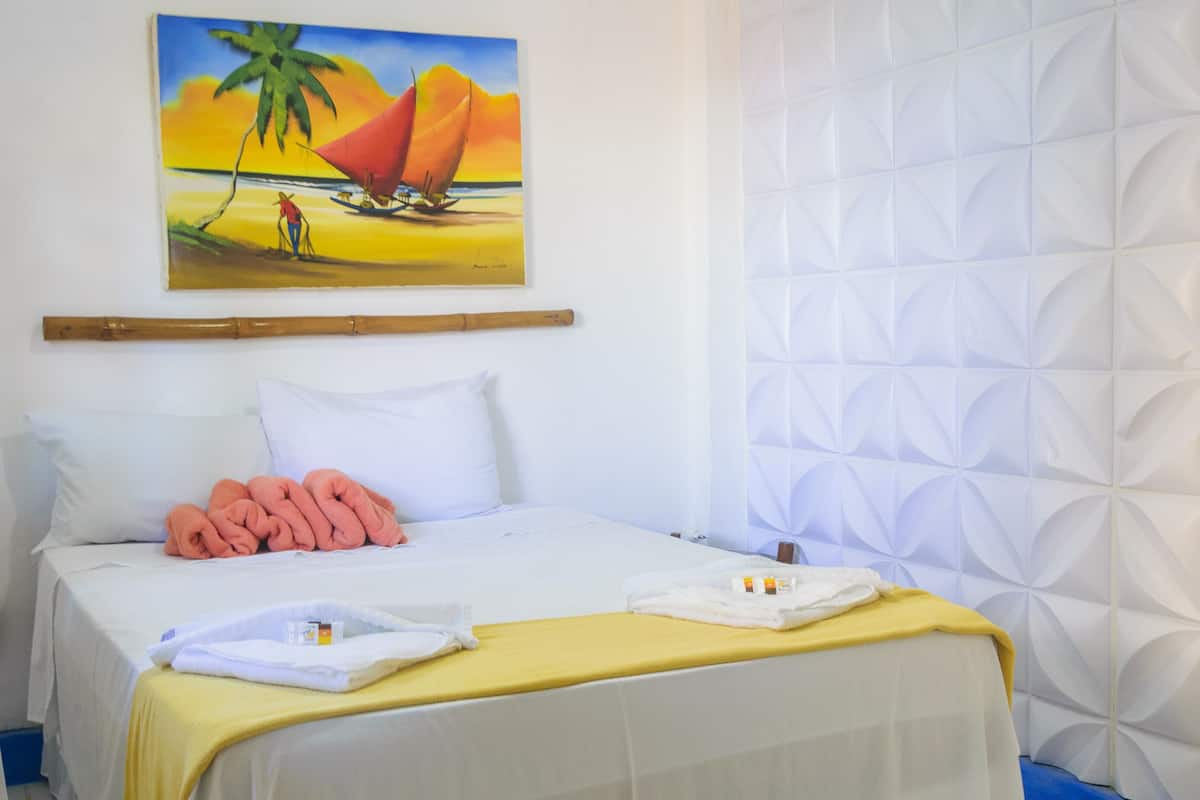 Economy Room, Ground Floor | Minibar, WiFi (free), bed sheets