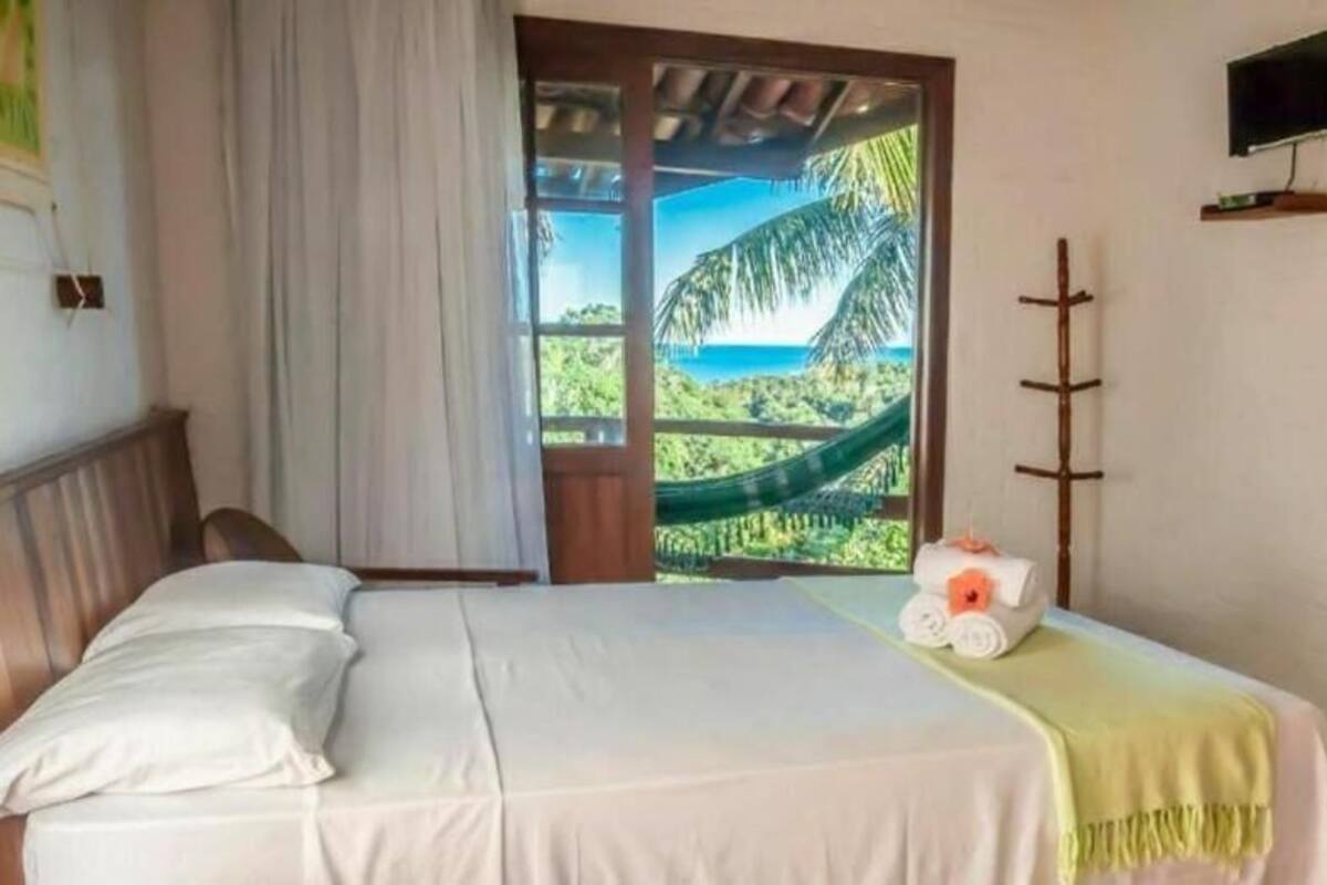 Superior Triple Room, Ocean View | Minibar, WiFi (free), bed sheets