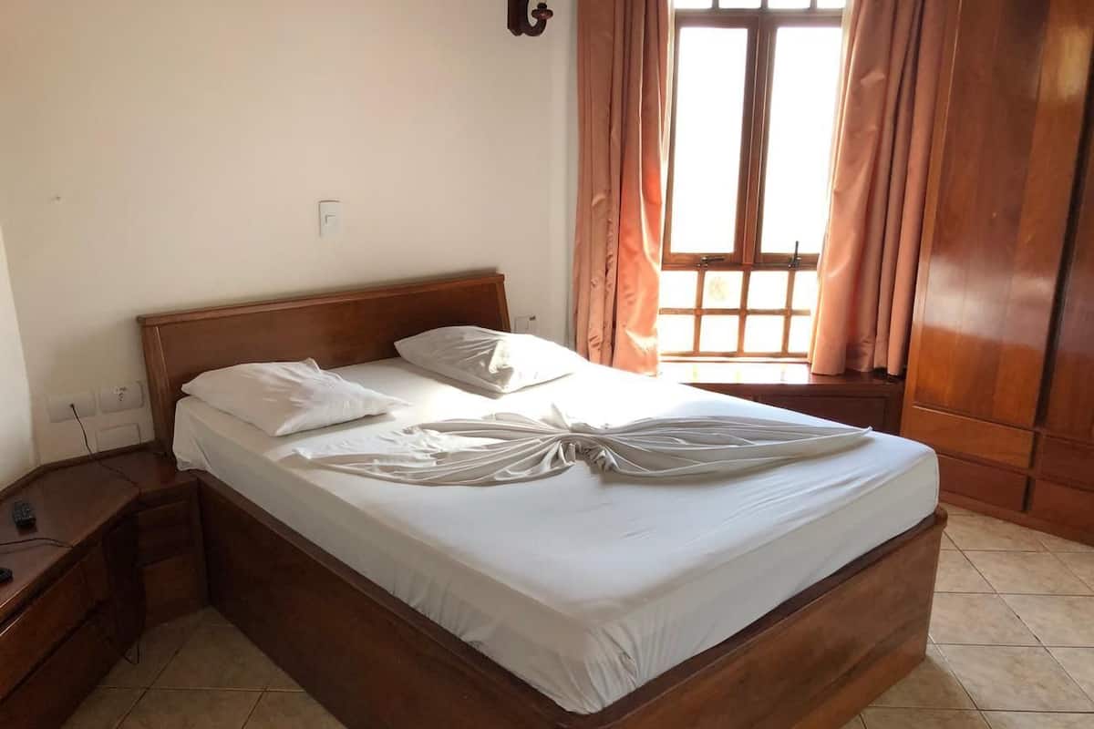 Deluxe Room | 2 bedrooms, minibar, blackout drapes, free WiFi