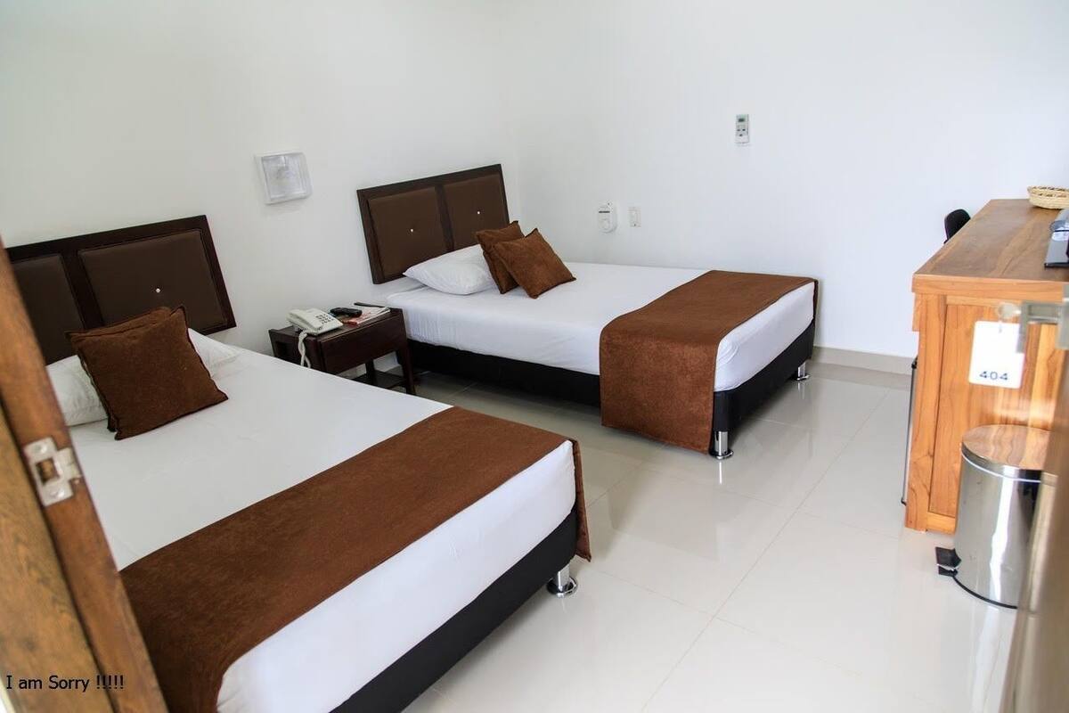 Standard Triple Room | Minibar, desk, iron/ironing board (on request), free WiFi