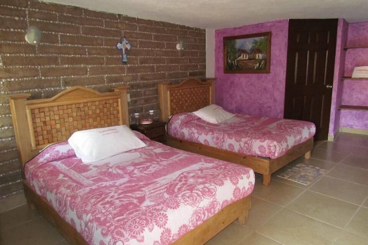 Chambre Deluxe, 2 lits doubles | Coffres-forts dans les chambres, lits pliants/supplémentaires gratuits