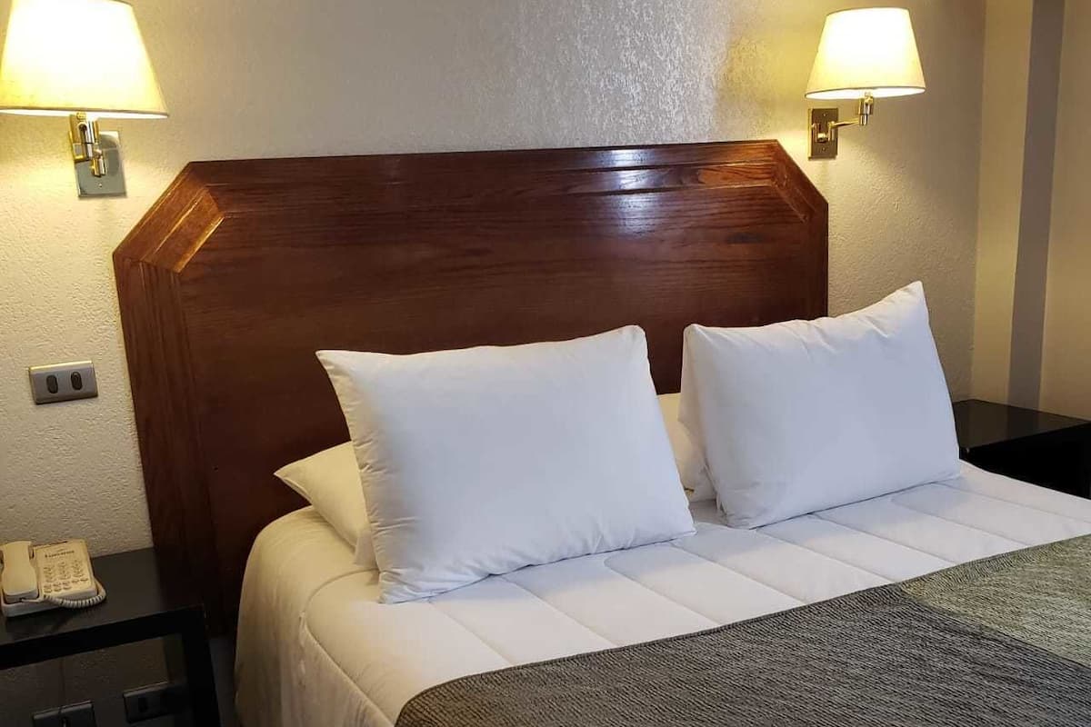 Executive tweepersoonskamer | Een kluis op de kamer, gratis wifi, beddengoed