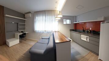 Comfort Loft | Living area | 32-inch Smart TV with cable channels