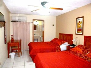 Double Room | Individually decorated, desk, laptop workspace, iron/ironing board - THE Green Frog Inn Bed and Breakfast (San Pedro Sula)
