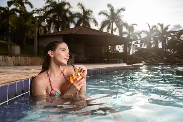 2 outdoor pools, pool umbrellas, pool loungers
