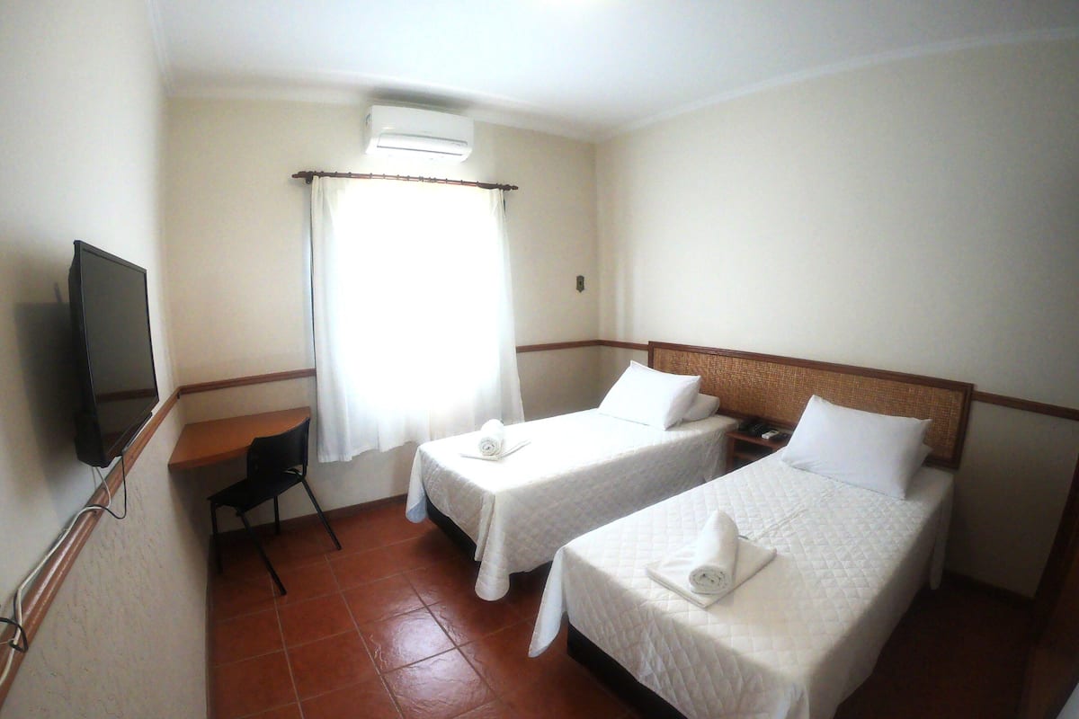 Minibar, desk, laptop workspace, blackout curtains
