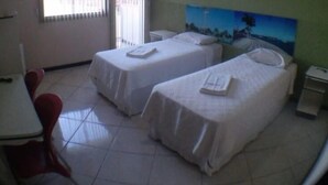 Double or Twin Room | Minibar, desk, iron/ironing board (on request), WiFi (free) - Hotel Nova América (Teixeira de Freitas)