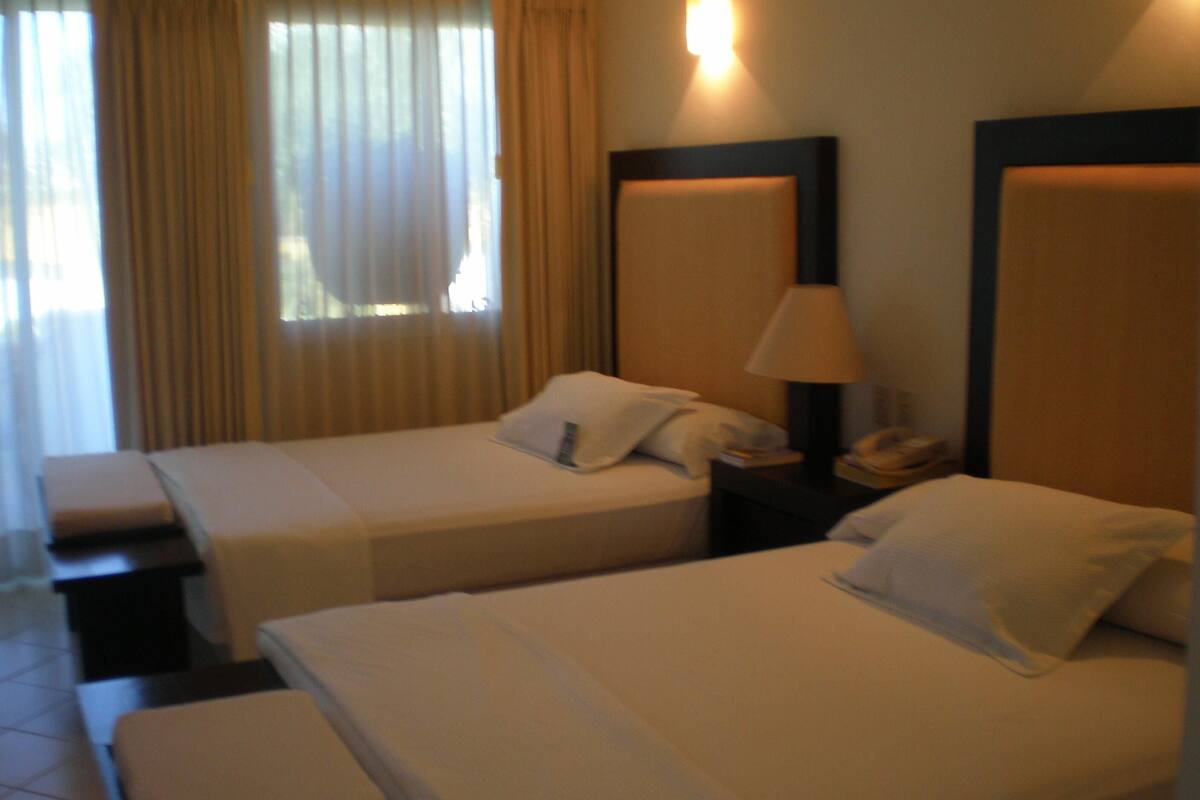 Premium bedding, pillowtop beds, desk, laptop workspace