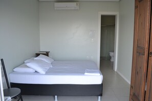 Basic Double Room | Minibar, blackout drapes, iron/ironing board, free WiFi