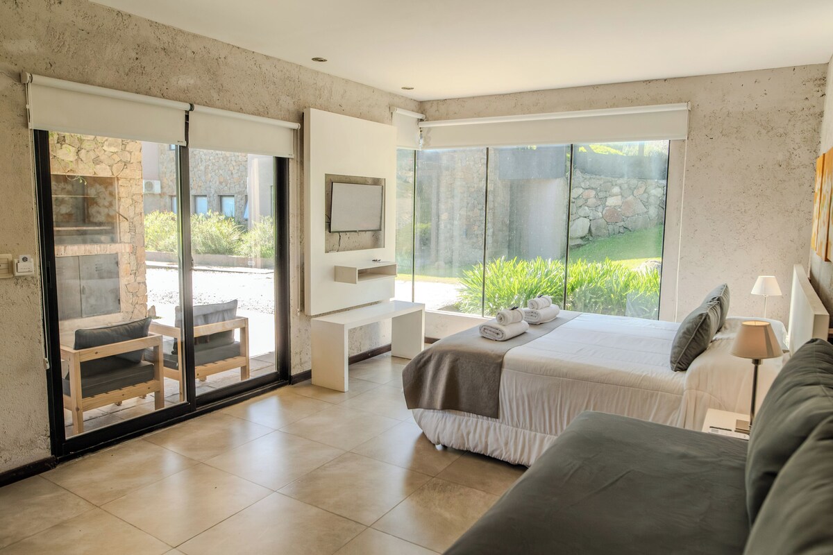 Apartment, Patio, Garden View | In-room safe, iron/ironing board (on request), WiFi (free)