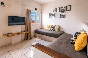 Apartment, Mountain View | Living area | 32-cm LCD TV with satellite channels, TV, pay films - Riviera Fueguina Apartments (Ushuaia)