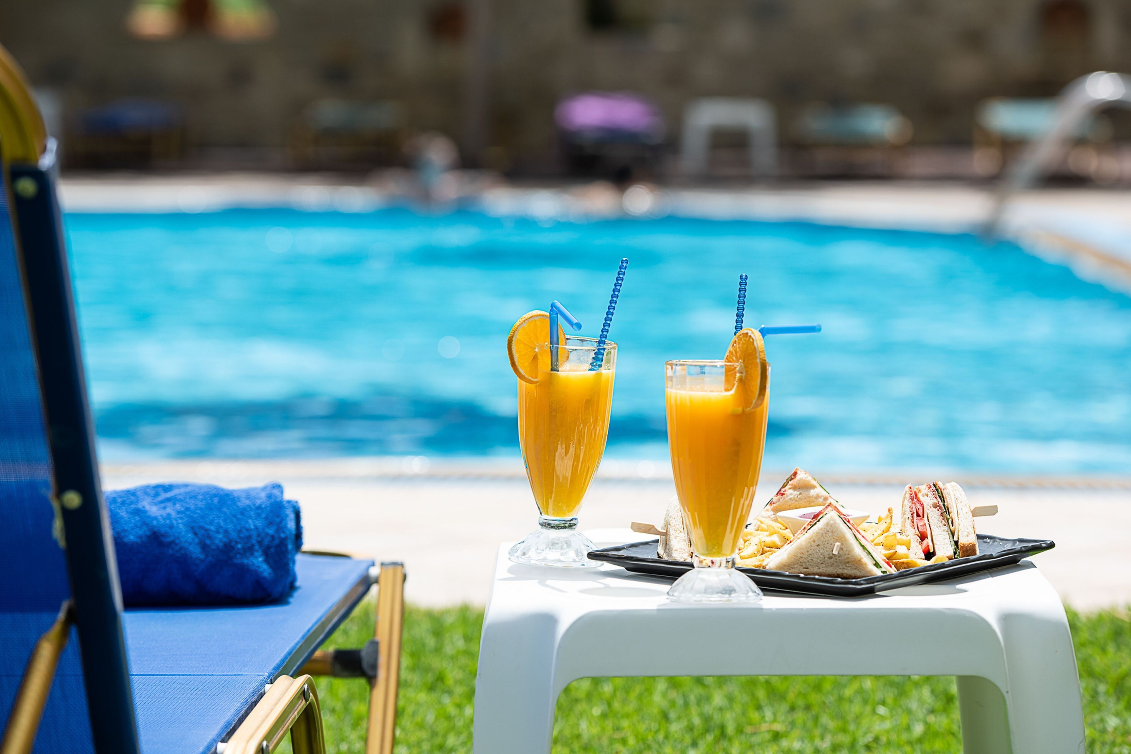 Seasonal outdoor pool, pool loungers